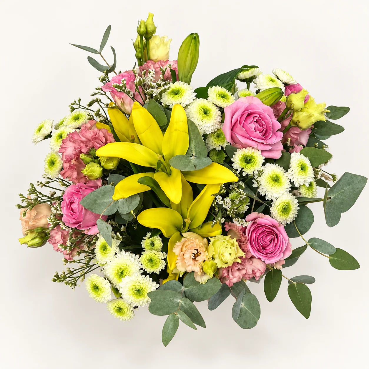 Vue du dessus du bouquet à prix canon aux fleurs jaunes, roses et blanches